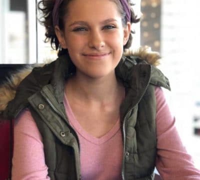 A picture of Hannah smiling.