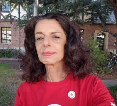 Christine Medeiros in a Red Cross shirt.